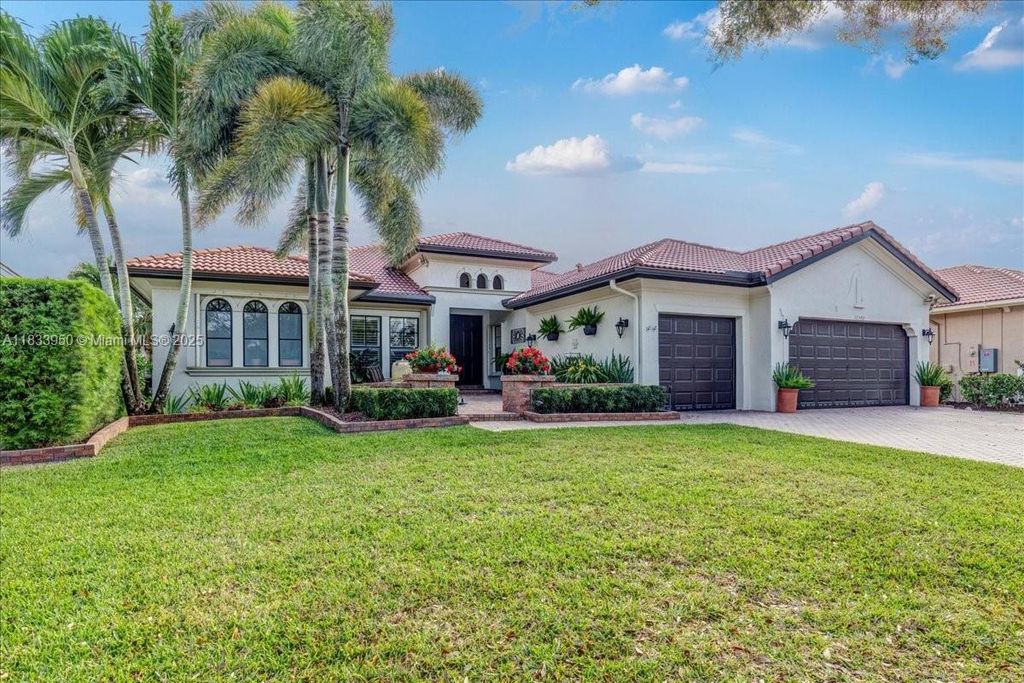 Photo of 12580 NW 76th St, Parkland, FL 33076 (MLS # A11833950)