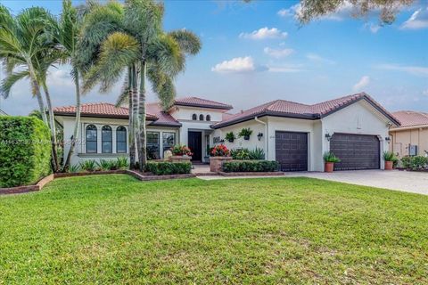 Photo of 12580 NW 76th St, Parkland, FL 33076 (MLS # A11833950)