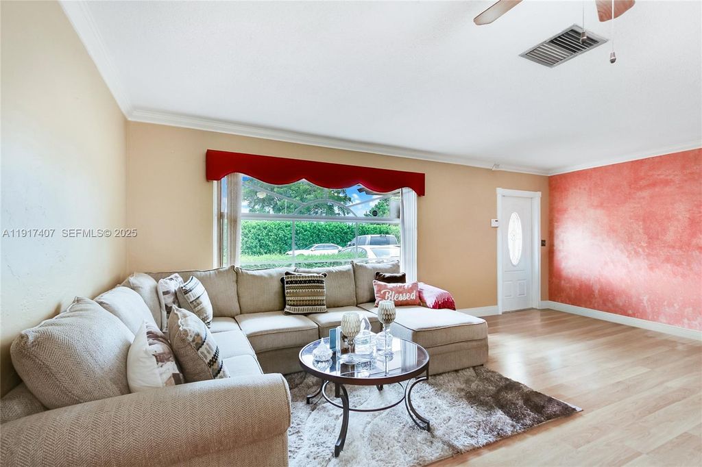 Photo of 7100 NW 99th Ave, Tamarac, FL 33321 (MLS # A11917407)