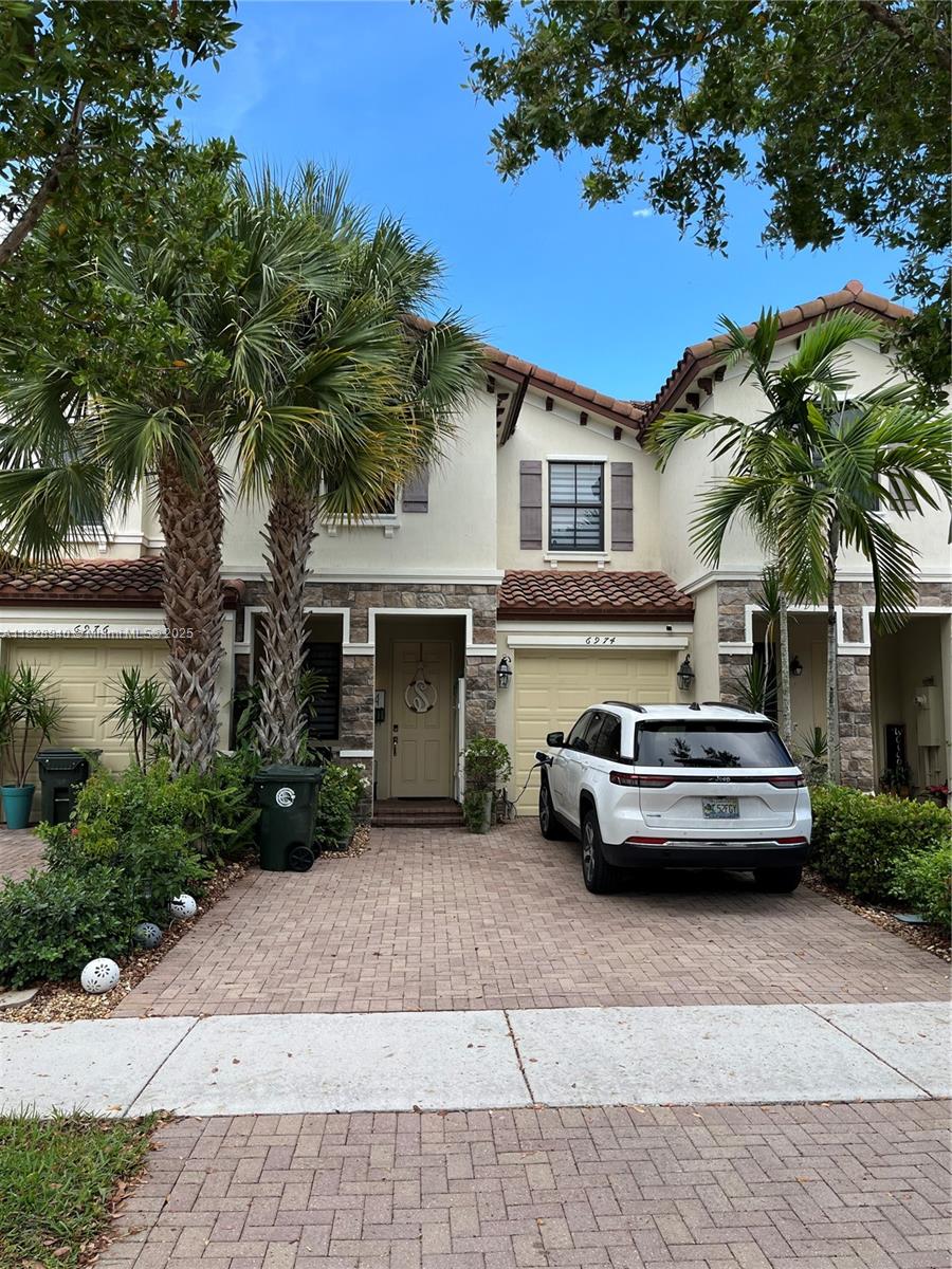 This beautiful townhouse in Coconut Creek is filled with natural light and charm. All bedrooms are conveniently located upstairs, offering ample closet space for comfortable living. Step outside to a serene and private backyard perfect for relaxing, entertaining, or enjoying quiet mornings surrounded by nature.