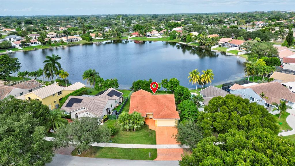 Photo of 6255 Hawkes Bluff Ave, Davie, FL 33331 (MLS # A12007619)