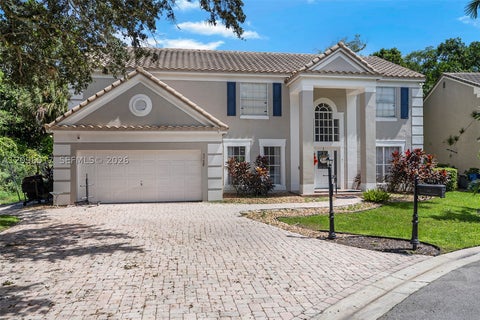 Photo of 3763 Cypress Fern Way, Coral Springs, FL 33065 (MLS # A12096017)