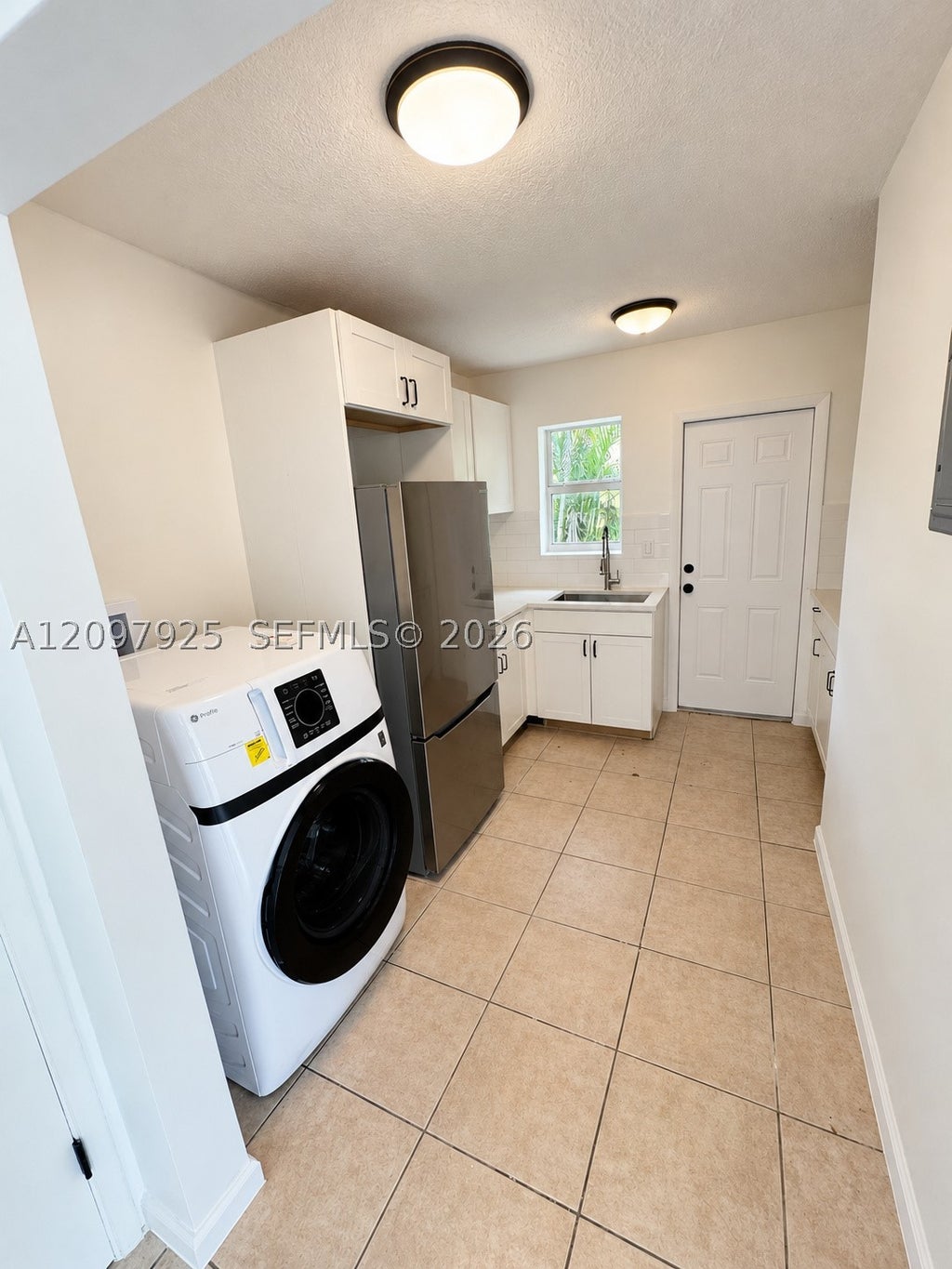Photo of 1521 NW 5th Ave, Fort Lauderdale, FL 33311 (MLS # A12097925)