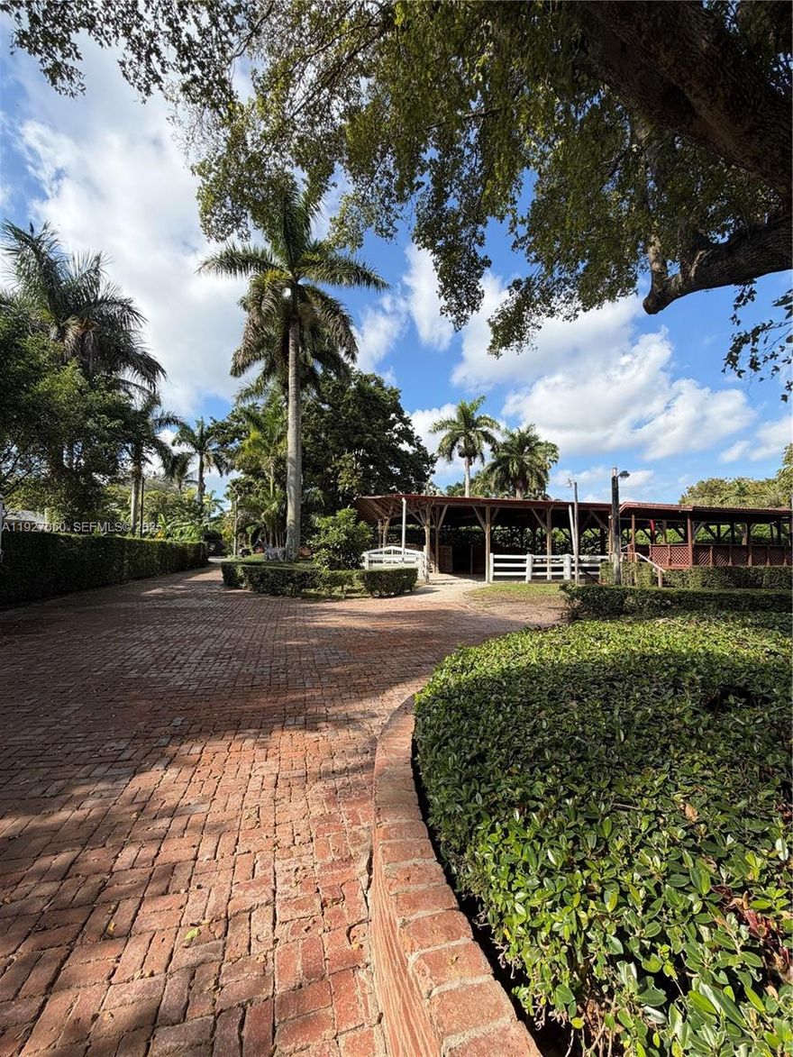 Discover the best of ranch-style living in the heart of Horse Country! This highly desirable 1.14-acre estate offers endless opportunities for both comfort and income.
The beautifully maintained 3-bedroom, 2.5-bath main home features spacious living areas and a sparkling private pool. Perfect for multi-generational living or rental income, the property also includes fully equipped in-law quarters (2/1) and a separate 1/1 apartment.
Equestrians will love the under-roof riding arena and ring, along with 20 stables available for boarding, creating excellent potential for steady revenue or a turnkey equine business.
Experience true ranch living while staying just minutes from city conveniences. Properties like this are incredibly rare!