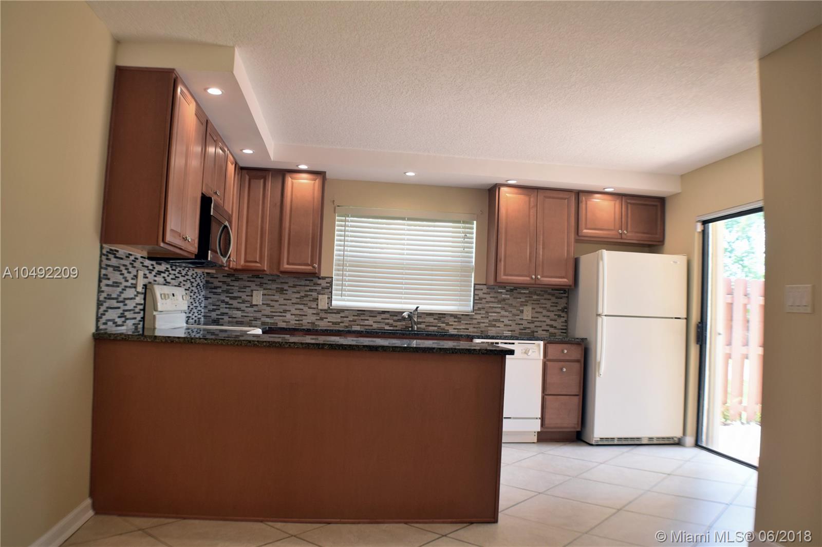 VILLAS AT WOODLAND GREENS - Residential