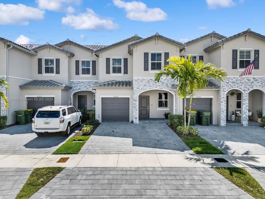 Newly built "smart" townhome with 3 spacious bedrooms, 2 full baths, a half bath downstairs, a garage and 1700sqft of living space. Stainless steel appliances with washer/dryer inside and impact windows throughout. Over-sized master bathroom and master closet. Ceiling fans in bedrooms & living space and decorative landscaping in patio yard. The Riviera is a gated community with clubhouse offering a fitness center, pool/hut tub, and a space to rent for hosting events. Centrally located within minutes of the Turnpike, Shopping Centers, Restaurants, and Schools. Low HOA.