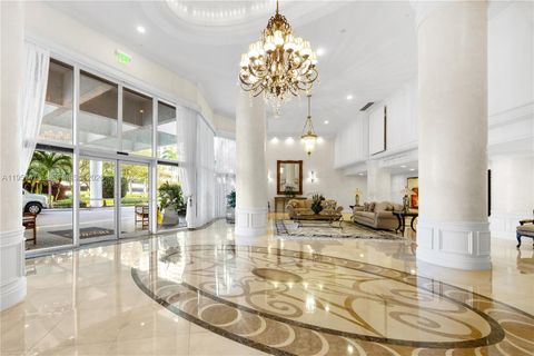 Photo of 3530 Mystic Pointe Dr #1206, Aventura, FL 33180 (MLS # A11951473)