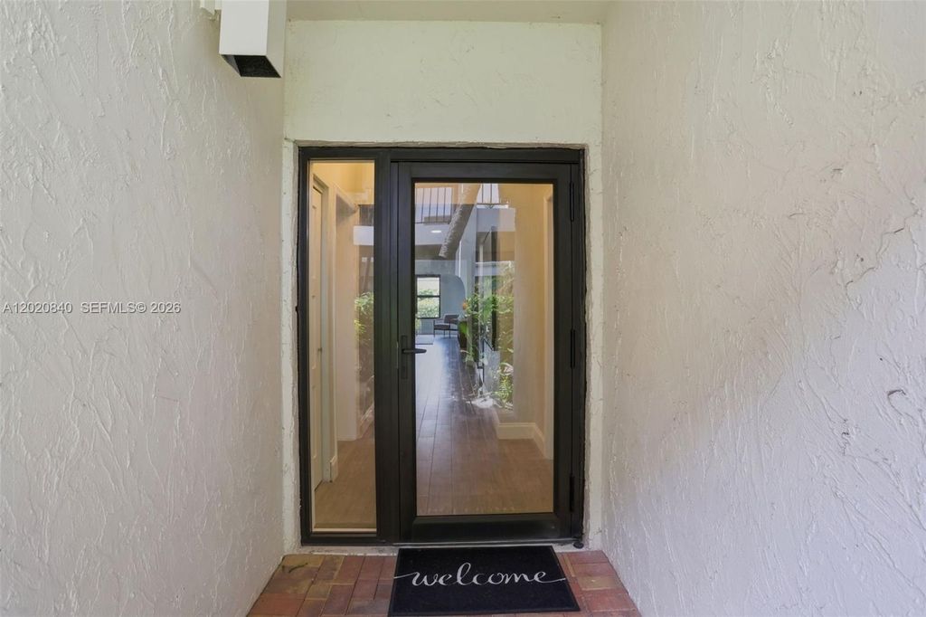 Photo of 830 Greensward Ct #106-H, Delray Beach, FL 33445 (MLS # A12020840)