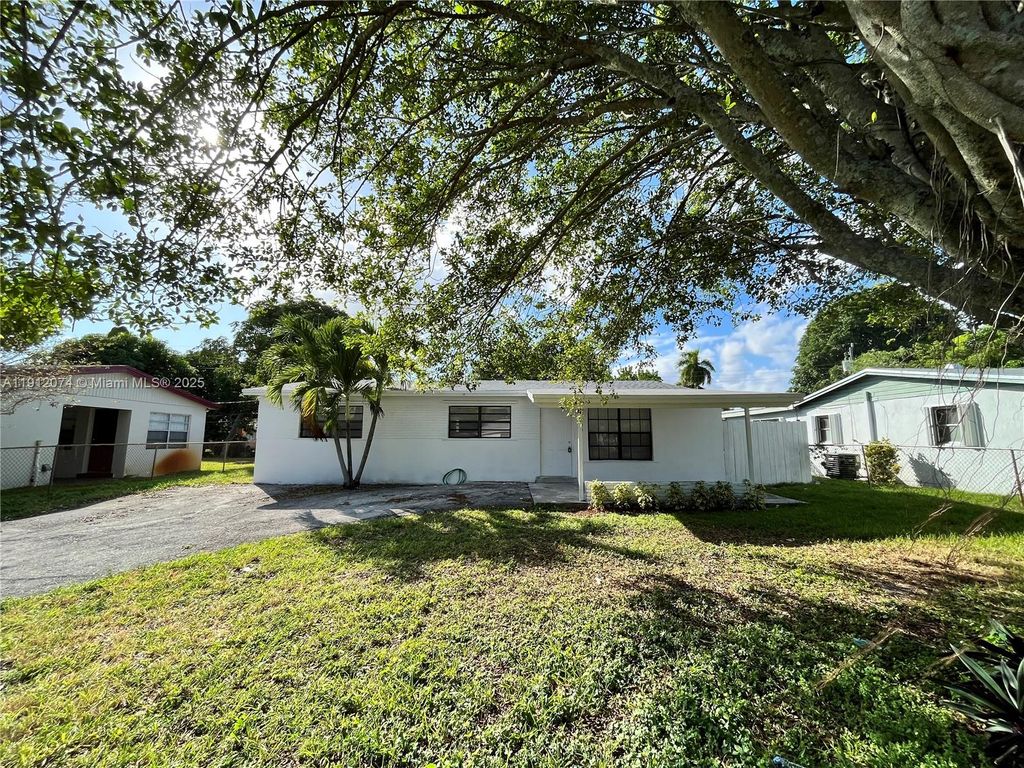 Photo of 2031 NW 30th Ave #2031, Fort Lauderdale, FL 33311 (MLS # A11912074)