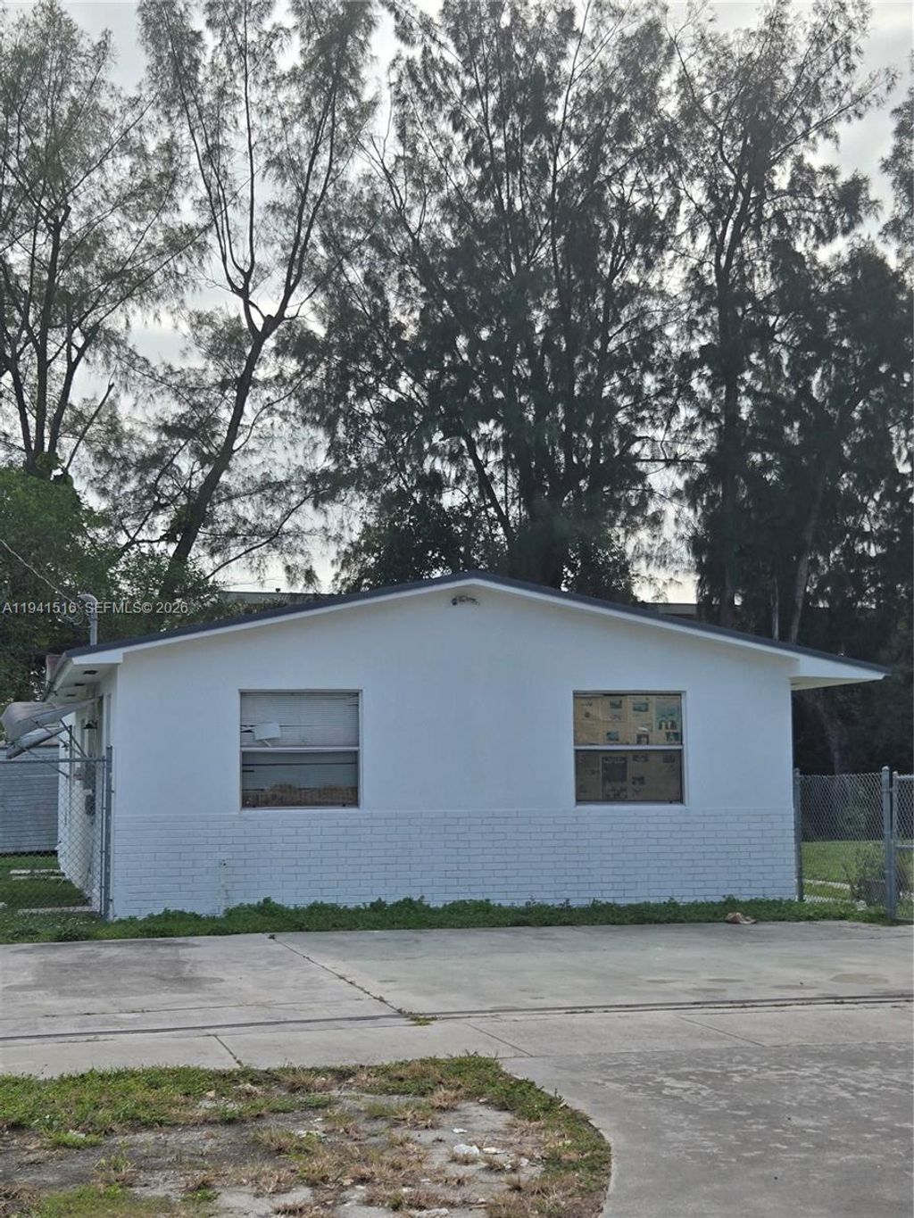 Photo of 1420 NW 111th St, Miami, FL 33167 (MLS # A11941516)