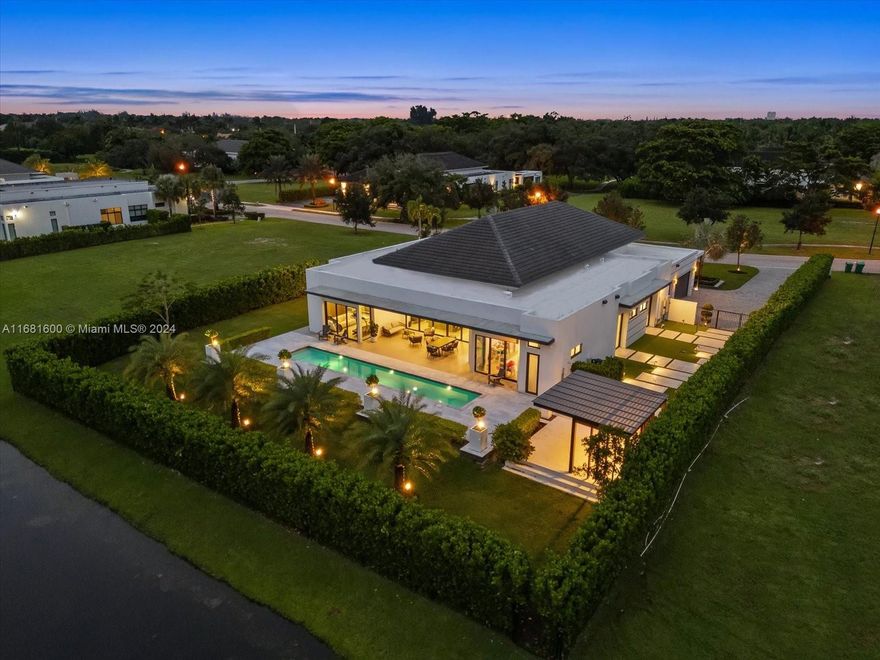 Welcome to your dream home in Davie! This stunning home boasts 5 beds, 5 and 2 1/2 baths, and a 3-car garage. Inside, you'll find an open floor plan, a 16ft ceiling office, a chef's kitchen, and tile flooring. The smart home features include lights, curtains, security cameras, and sound systems, allowing you to control your home easily. The water filter system ensures clean and fresh water. The outdoor BBQ area with top-of-the-line appliances. The landscaping design around the property adds to the beauty of the home, the custom closets by California Closets provide ample storage space, and the professionally installed wallpaper by a designer adds a touch of elegance to every room. Don't miss out on the opportunity to own this exceptional property in an exclusive community in Davie.