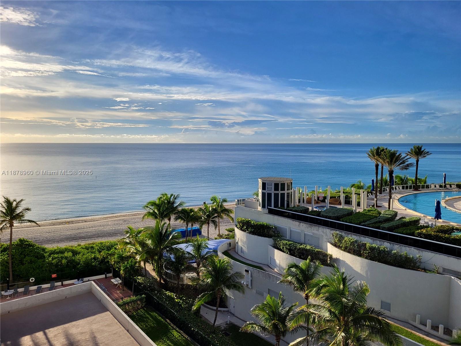 Wake up to spectacular ocean views from this beautifully appointed 2-bedroom, 2-bathroom condo located in the heart of Sunny Isles Beach. Perfectly situated in a well-managed beachfront building, offering the ideal blend of comfort, convenience, and coastal living with low fees.
Bright, open layout with floor-to-ceiling windows that fill the home with natural light and frame sweeping views of the Ocean. Enjoy sunrise coffee or evening cocktails with spectacular east to west views.
The primary suite boasts its own ocean views, ample closet space, and an en-suite bath. A generous second bedroom and bath provide comfort for family or guests.
Residents enjoy resort-style amenities including direct beach access with chair and umbrella service, pool, fitness center & on-site management.