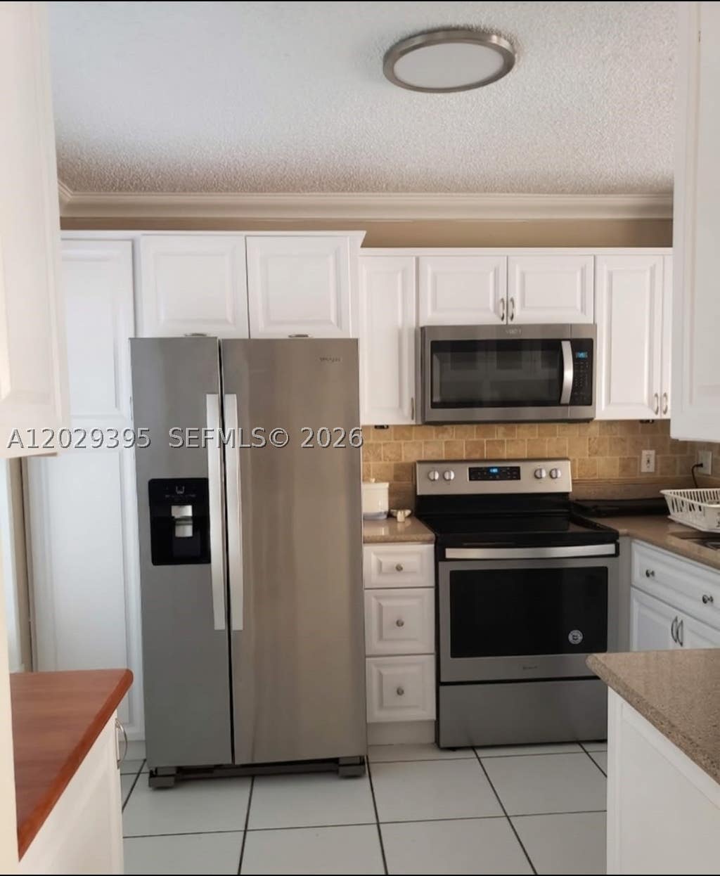 Photo of 223 Maple Ter, Davie, FL 33325 (MLS # A12029395)