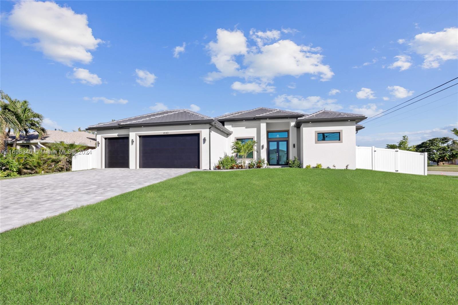 WELCOME to this stunning new construction home with a great pool and spa. With 3 bedrooms and den, 3 full bathrooms, spacious areas and high ceiling, a custom and modern kitchen, a pantry, a dining area and abundant closets. Luxury granite countertops, beautiful fans, ligth and fixtures. Expansive lanai and pool deck, outdoor shower. Don't miss this opportunity to make this your dream home in Cape Coral.