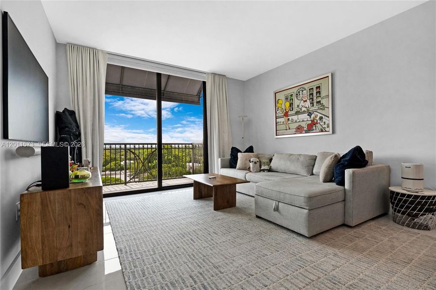 The only 1 bedroom unit currently available for sale at Merrick Manor with unobstructed views and total privacy. Great terrace with views of the Biltmore Hotel; watch their 4th of July and New Year's fireworks! Building features secured elevator access in unparalleled location in Coral Gables' chic Shops of Merrick Park neighborhood! Easy commute to the University of Miami, Downtown Coral Gables, and Miami International Airport.  Residence features fine, contemporary finishes" Italkraft cabinets and 2 closets, full sized GE washer/dryer, quartz countertops, Bosch appliances, Nest thermostat, keyless locks, high ceilings, blackouts and blinds. Impeccable, resort-style amenities and services: saline heated pool, summer kitchen, upscale fitness center, 24HR concierge and security, valet services, business center, conference room, dog washing station, EV charging, and more. Pet friendly building.  Upgrades to this unit not provided by developer include: drapes in living and bedroom, lighting in bedroom laundry area, laundry shelves, new dining area light fixture, dining area shelving, in-wall TV wire concealment. West Elm furniture and TVs are negotiable outside of purchase price (ask for list of items).