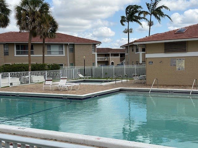 Photo of 922 Twin Lake Dr #922, Coral Springs, FL 33071 (MLS # A12025737)