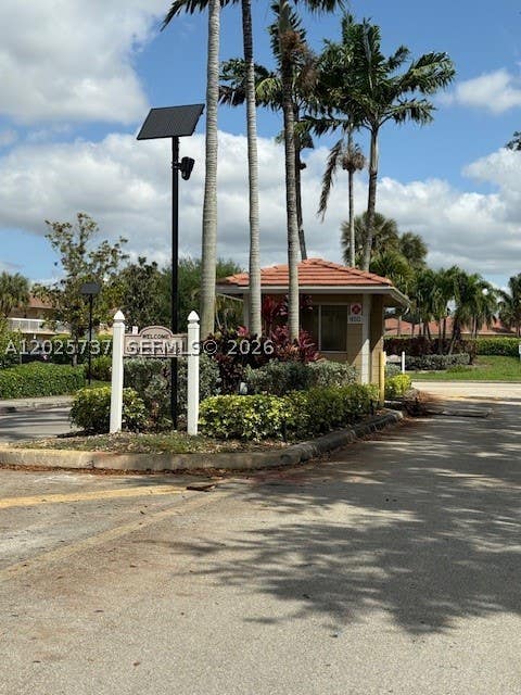 Photo of 922 Twin Lake Dr #922, Coral Springs, FL 33071 (MLS # A12025737)