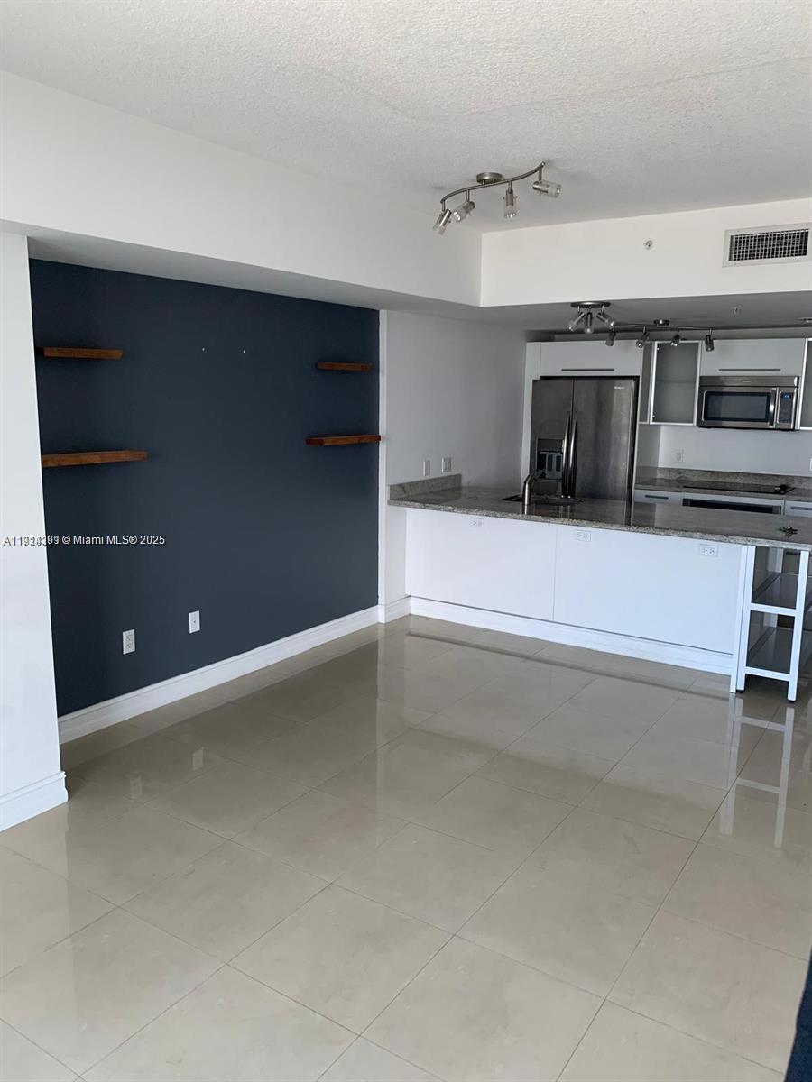 LATITUDE ON THE RIVER CON - Residential Lease