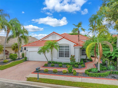 Photo of 1545 W Lacosta Dr W, Pembroke Pines, FL 33027 (MLS # A12092529)