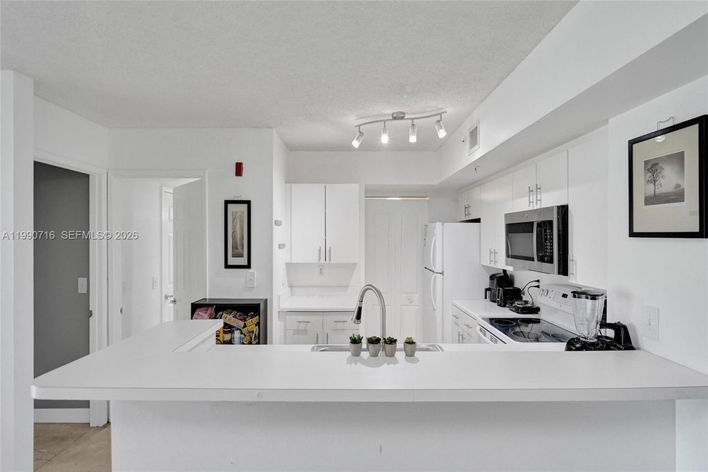 Photo of 2640 S University Dr #112, Davie, FL 33328 (MLS # A11990716)