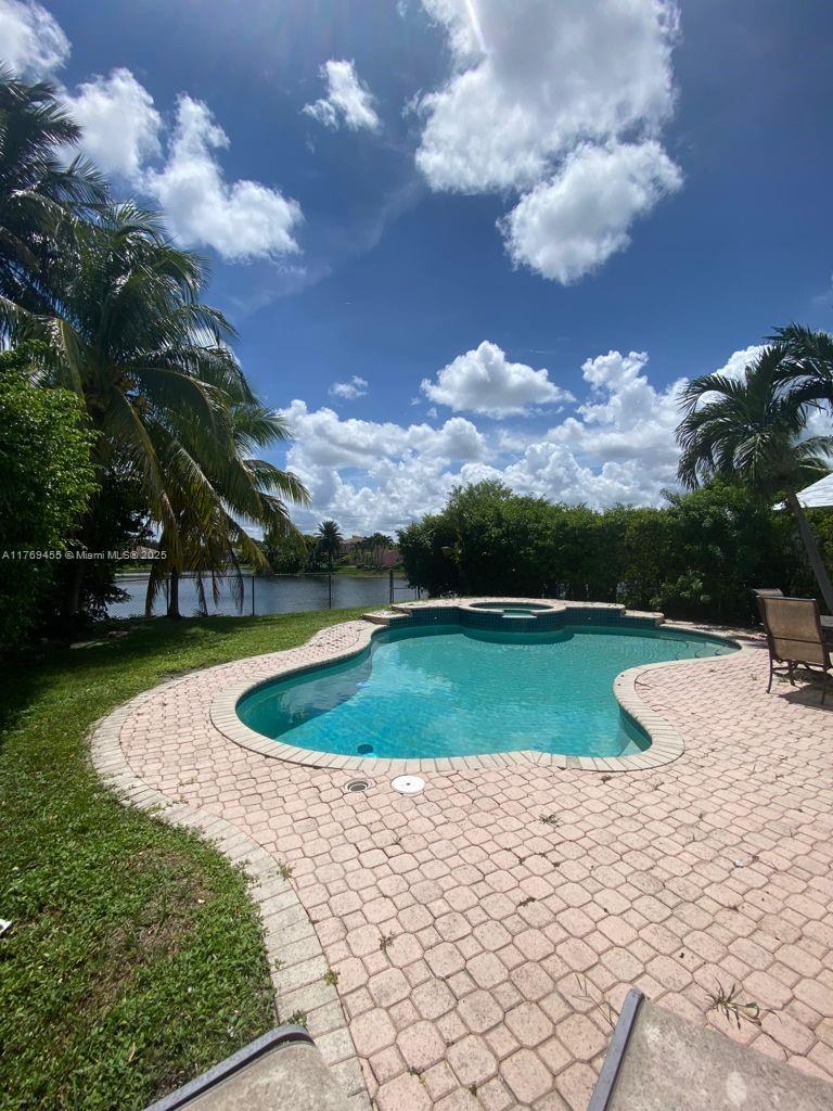 Photo of 10228 SW 23rd Ct, Miramar, FL 33025 (MLS # A11769455)