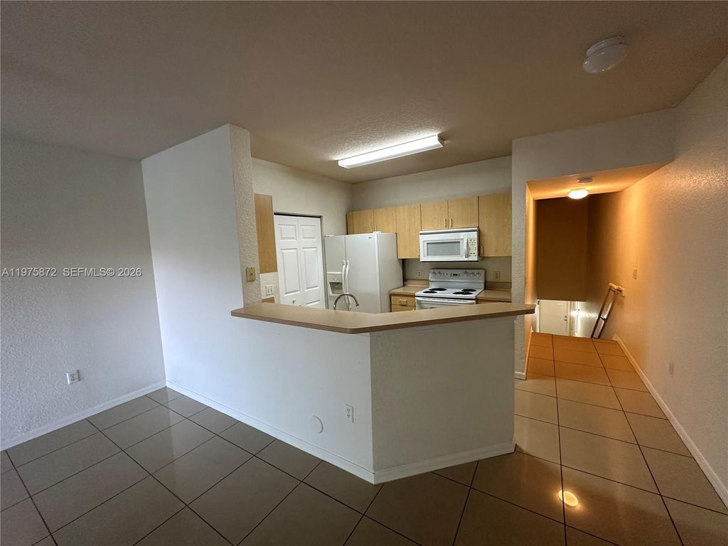 Photo of 2303 Belmont Ln #2303, North Lauderdale, FL 33068 (MLS # A11975872)