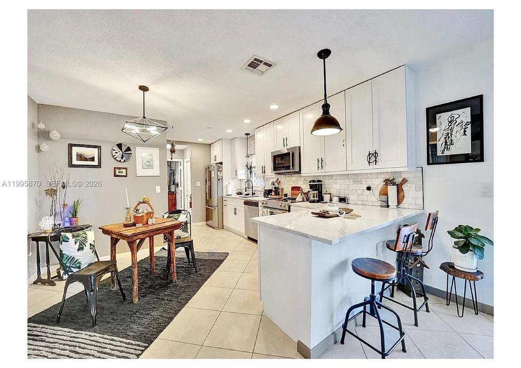 Photo of 381 NE 42nd St, Oakland Park, FL 33334 (MLS # A11995870)