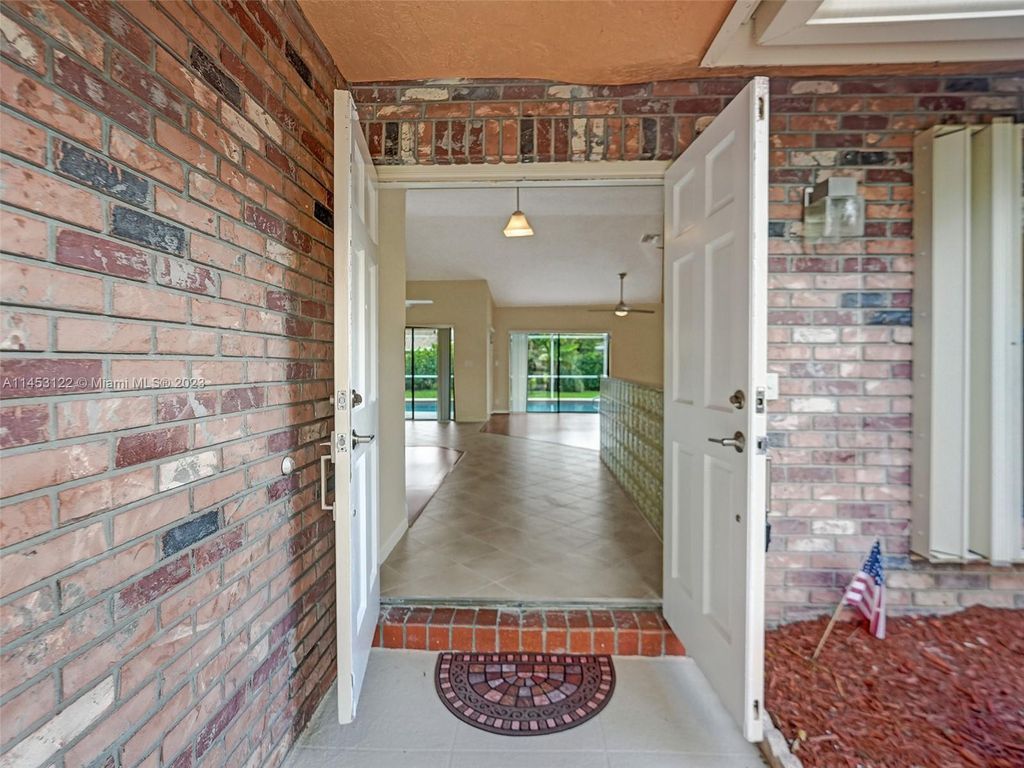Photo of 9005 NW 49th Ct, Coral Springs, FL 33067 (MLS # A11453122)