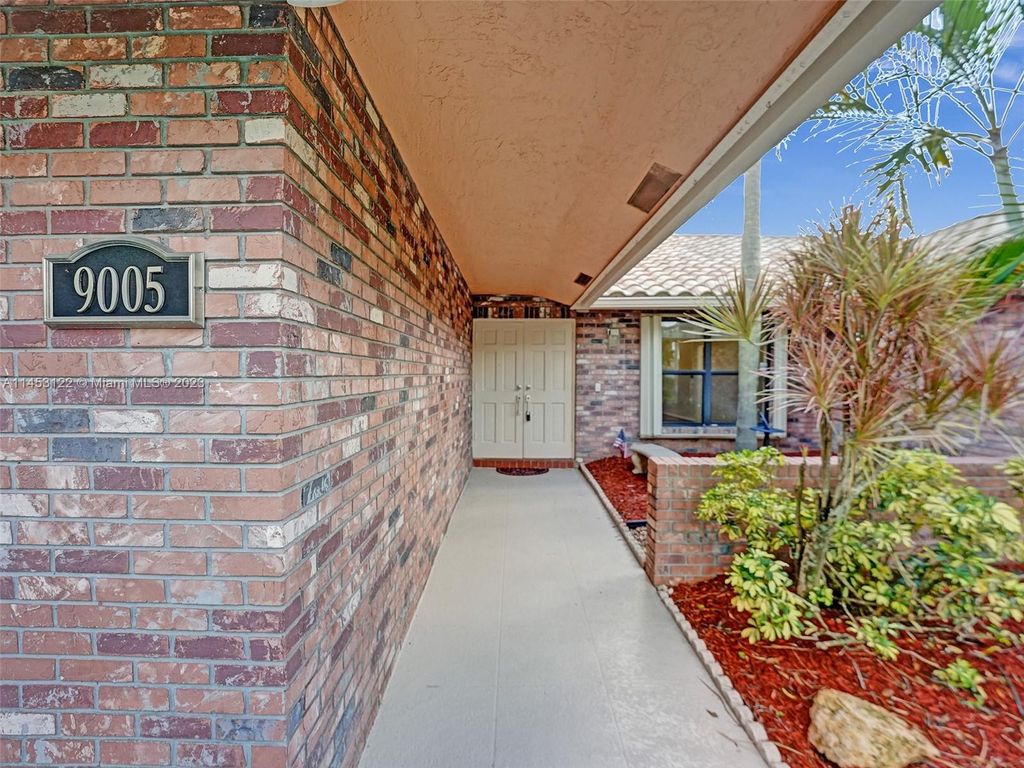 Photo of 9005 NW 49th Ct, Coral Springs, FL 33067 (MLS # A11453122)