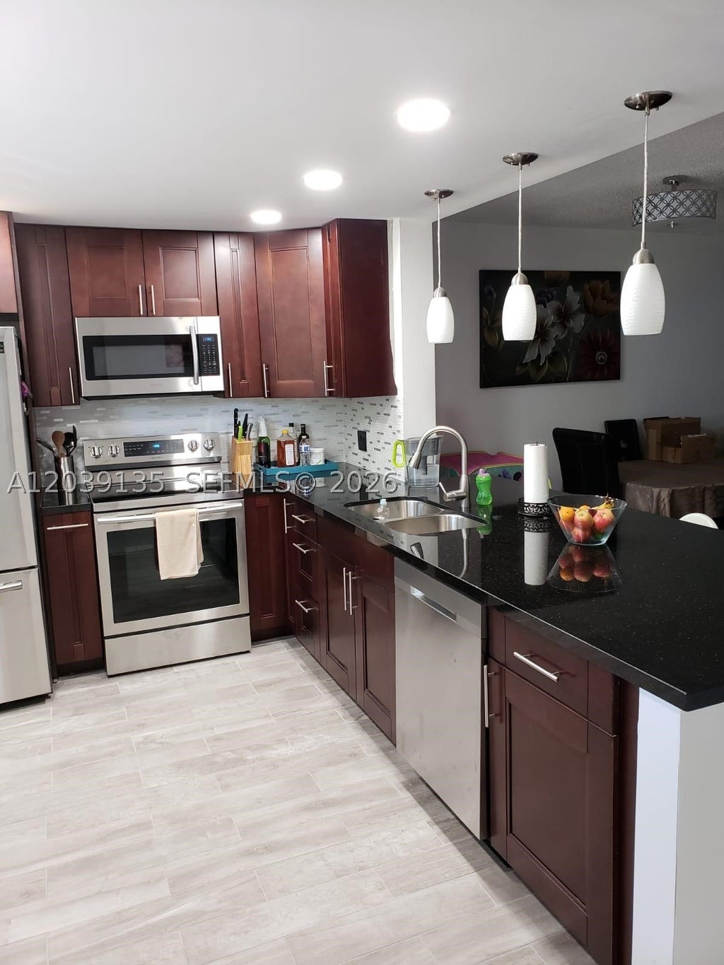 Photo of 900 NE 12th Ave #302, Hallandale Beach, FL 33009 (MLS # A12039135)