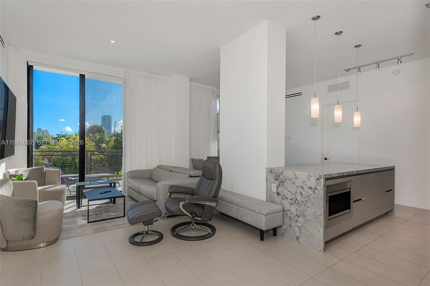 Modern South Beach living in one of the area’s few newer buildings — priced under $1,000/SF.
This 2 Bed + Den / 2.5 Bath residence is sun-filled, move-in ready, and finished with sleek contemporary design. The den fits a queen bed, ideal as a guest room or home office.

Owned since 2022 and used only seasonally, the unit is in like-new condition and has never been rented. One of the few buildings in Miami Beach offering a full amenity package, including garage parking, gym, and pool.

Features include an Italian-designed kitchen with Smart Samsung appliances, frameless rain-shower bathrooms, walk-in closets, and in-unit washer/dryer. Includes 2 assigned parking spaces, a rare find in South Beach.

Ideally located near Lincoln Road and Flamingo Park, just minutes to the ocean, Sunset Harbor, top dining, nightlife, and premier fitness clubs like Anatomy and Equinox.

Newer construction. Prime location. Exceptional value.