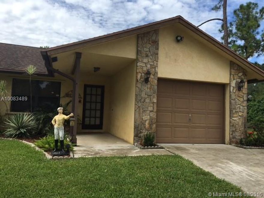This equestrian 3/2 home with 2 stall HURRICANE SAFE CBS HORSE BARN PLUS tack room is ready for you and your horses today, on a manicured 1.25 acres with 2 connecting paddocks. Great Schools, nearby trails and parks. Call now for an appointment to  see. Quick closing possible. lots of parking. plenty of room to build a pool, all fenced in yard. House carpet in all bedrooms ,tile in the rest of the house. EASY TO SEE.  PRICED TO SELL!!!! MUST SEE..