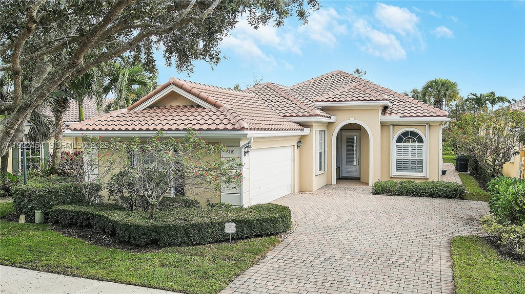 Photo of 5119 Magnolia Bay Cir, Palm Beach Gardens, FL 33418 (MLS # A11922454)