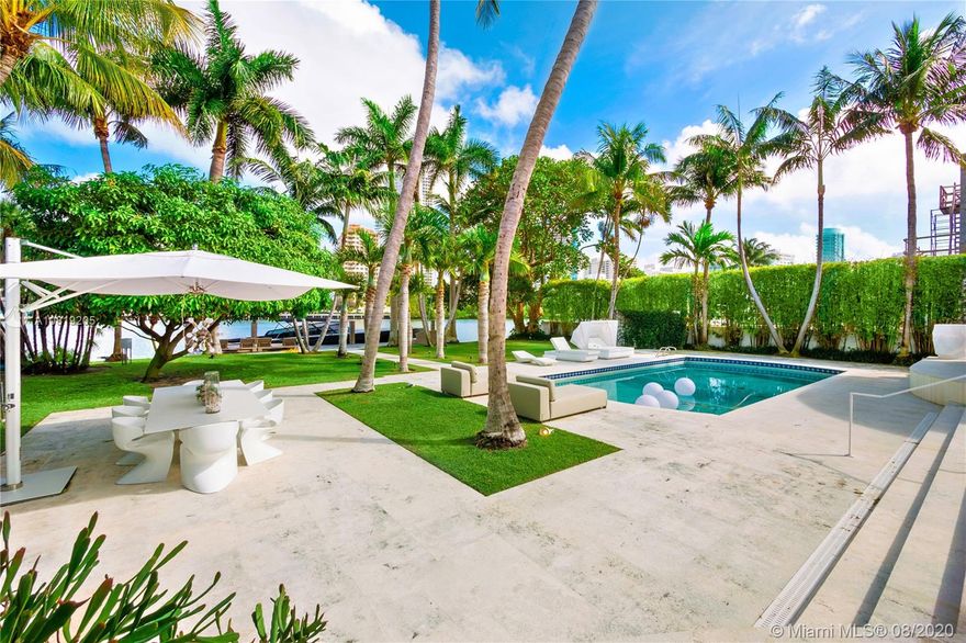 Welcome to guard gated Allison Island. This 21,600 SF manicured lot is secured by a privacy wall. This 6 bedroom, 4 bath was fully renovated with cararra marble and oak hardwood floors throughout. With the exception of Indian Creek and Star Island, Allison Island is one of the only 3 guard gaye islands in Miami Beach where EVERY home is on the water. The open living room and dining room have 15' ceilings and an abundance of natural light. The gourmet kitchen has an open plan with Italian cabinetry. The master bedroom is spacious with beautiful water views. The back yard has a pool, an entertainment area and a private 50' x 10' dock. Owner claims home is 4,850 SF - there is a discrepancy with the tax roll.