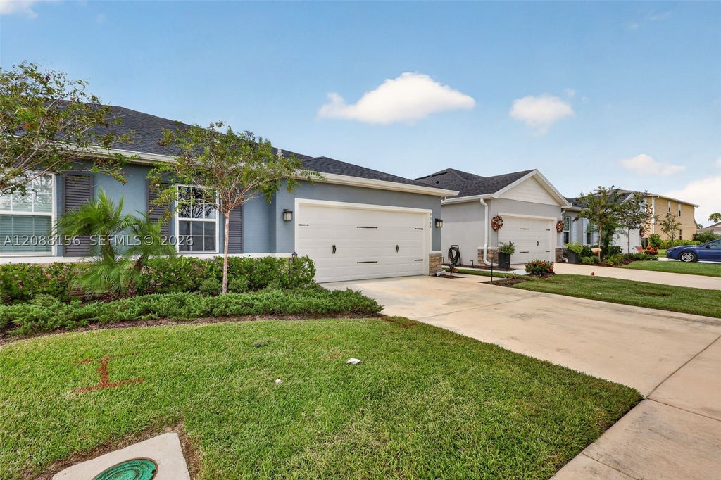Photo of 9364 SW Libertas Way, Port St Lucie, FL 34987 (MLS # A12088156)