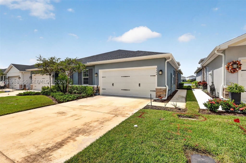Photo of 9364 SW Libertas Way, Port St Lucie, FL 34987 (MLS # A12088156)