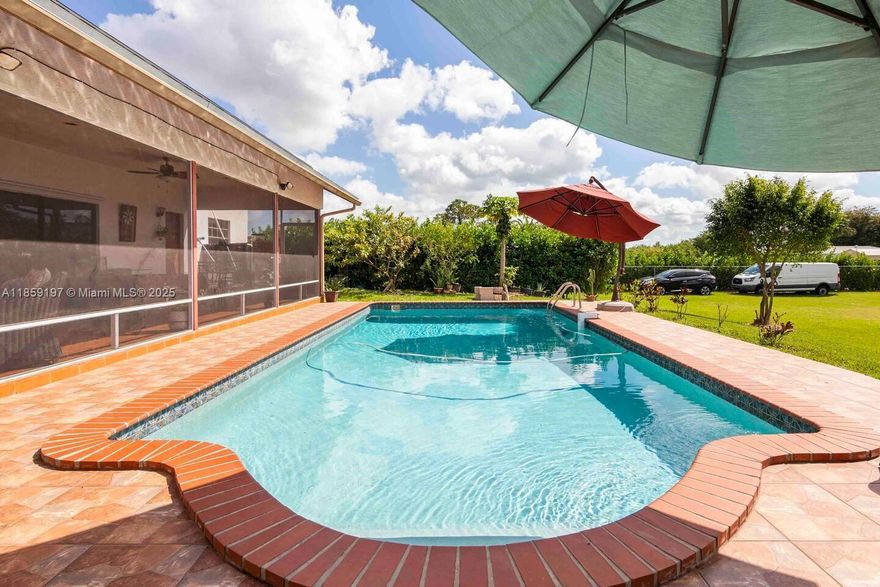 Seller is offering $15,000 towards your closing costs — making it easier to move into your dream home!
This exceptional Farm & Resort-Style property in Homestead/Redlands offers unmatched value. Featuring solar panels, a heated pool, a custom-built tiki hut, whole-house water filtration, and lush Celosias landscaping for natural privacy, this estate was thoughtfully upgraded to maximize comfort and lifestyle.
Set on over an acre of land, this private retreat combines tranquility, functionality, and resort-style living.
Escape to your own private farm-style retreat in the heart of Homestead! This spacious property offers the perfect blend of peaceful country living and resort-style comfort. One of the room has private entrance and bathroom can be use as an office or extra income.