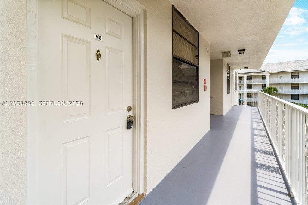 Photo of 3650 Whitehall Dr #305, West Palm Beach, FL 33401 (MLS # A12051892)
