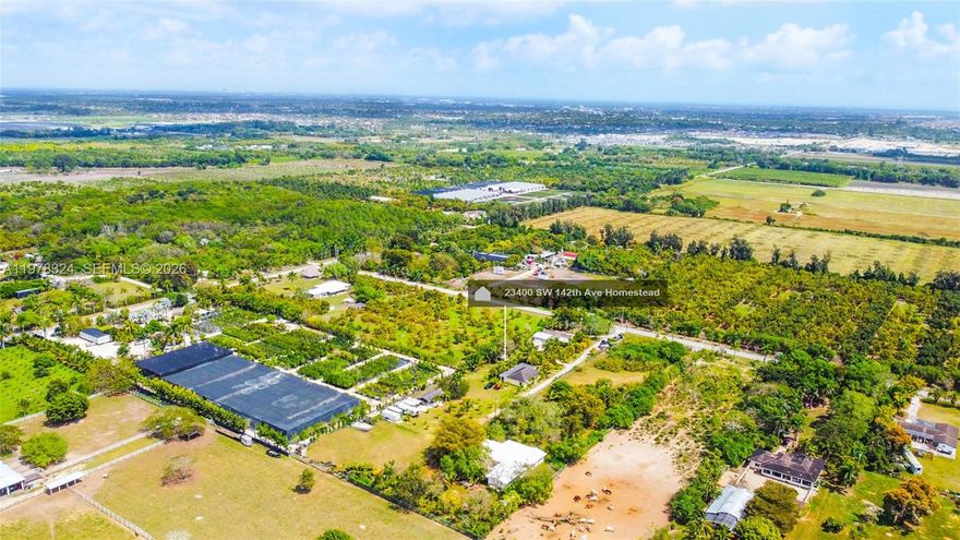 Captivating 3BD/2BA ranch-style home situated on nearly 2 acres, featuring a separate 2BD/2BA in-laws’ cottage—perfect  potential rental income. The main home has been remodeled and includes a new roof and A/C unit. Interior features include a Florida room with bar area, formal dining room, and family room, providing comfortable and functional living spaces. Unique construction details include a Dade County pine roof and a concrete ceiling in the master bedroom.

The in-laws’ cottage offers its own charm with a partial wrap-around patio and wood roof, creating a relaxing outdoor setting.

Outdoor amenities include a covered pergola over an outdoor BBQ/bar area and fire pit, ideal for entertaining. The property also features a well-maintained chicken coop and a post-frame barn, centrally located on the land. Plenty of space for gardening, hobby farming, or enjoying peaceful country living while still being conveniently located near local amenities.