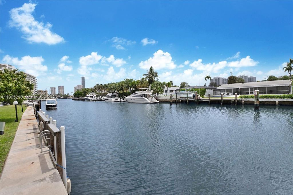 Photo of 455 Paradise Isle Blvd #101, Hallandale Beach, FL 33009 (MLS # A11995210)