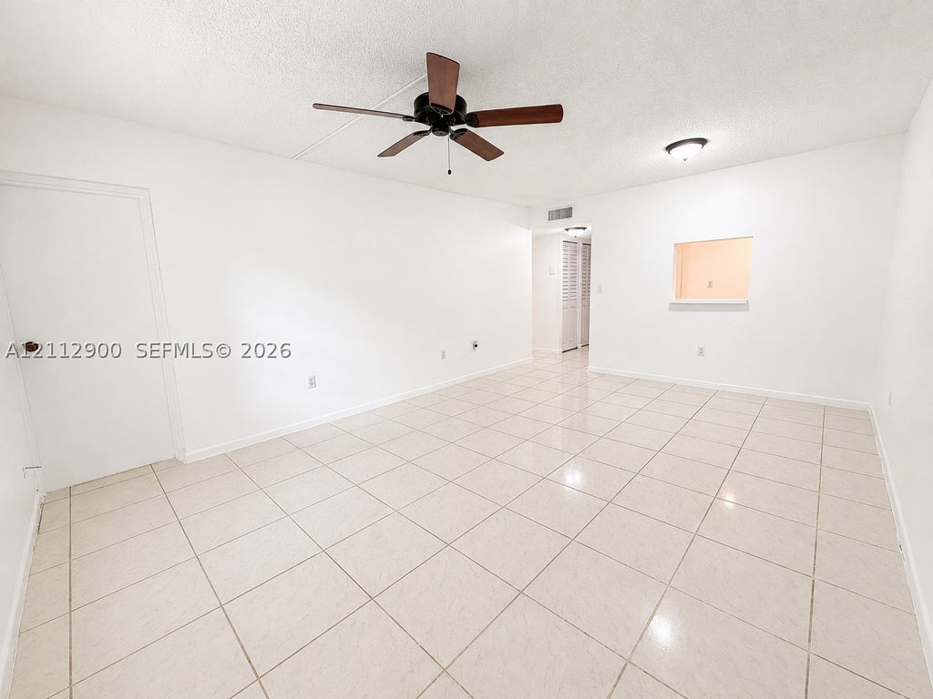 Photo of 4384 NW 9th Ave #18-2A, Deerfield Beach, FL 33064 (MLS # A12112900)