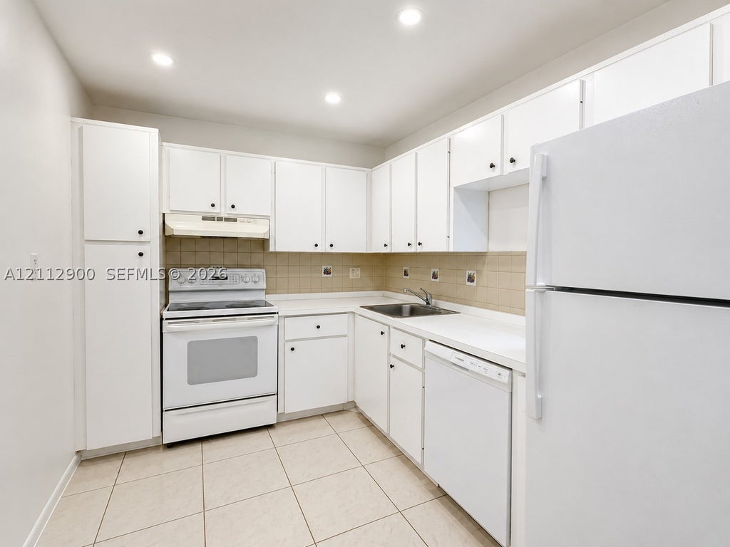 Photo of 4384 NW 9th Ave #18-2A, Deerfield Beach, FL 33064 (MLS # A12112900)