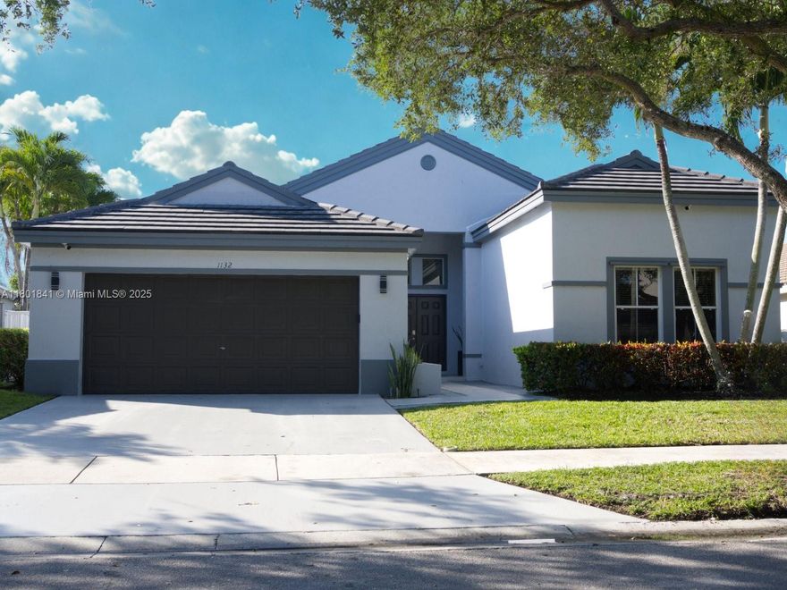 SPECTACULAR Lake Views at Sunrise and Sunset! UNBEATABLE LOCATION! POOL HOME at THE FALLS, WESTON. NEW ROOF (Done in 2023), RENOVATED KITCHEN with Quartz Counters. Walking distance to Eagle Point Elementary, access to Tequesta Trace Middle and Cypress Bay High. 5 minute drive to Publix,  575 & I-75 highways. 10 Minutes from Cleveland Clinic, Regional Park, and Markham Park. Gated community.  4 bedrooms with 2.5 baths. Open & split floor plan with 2-car GARAGE WITH EPOXY FLOOR. Extended Lanai & outdoor social area. Tankless Water Heater, New Washer and Dryer, Wired CCTV System, Doorbell. Master bedroom with walking closet and bath, Rolling shades and blackouts, Storm accordions for sliding and panel shutters covering all windows.