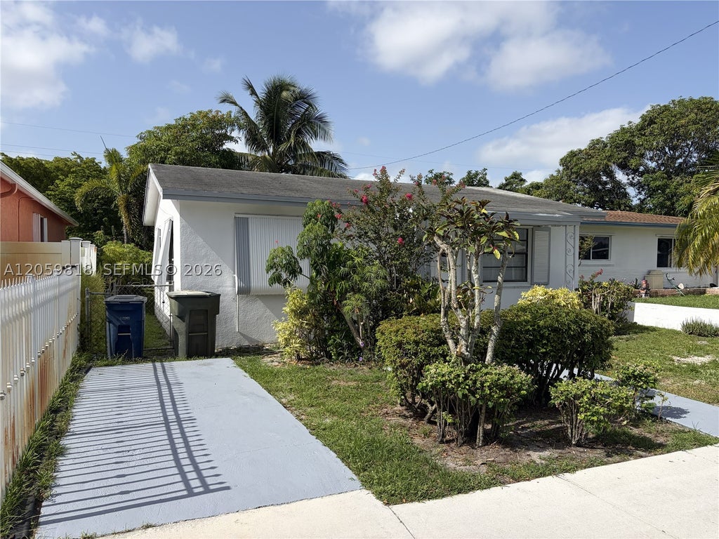 Photo of 613 NW 5 Ct, Hallandale Beach, FL 33009 (MLS # A12059818)