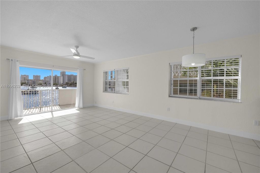 Photo of 462 Golden Isles Dr #210, Hallandale Beach, FL 33009 (MLS # A11996232)