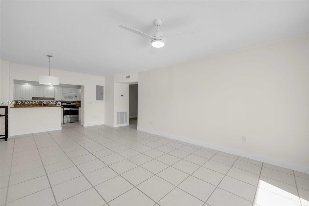 Photo of 462 Golden Isles Dr #210, Hallandale Beach, FL 33009 (MLS # A11996232)