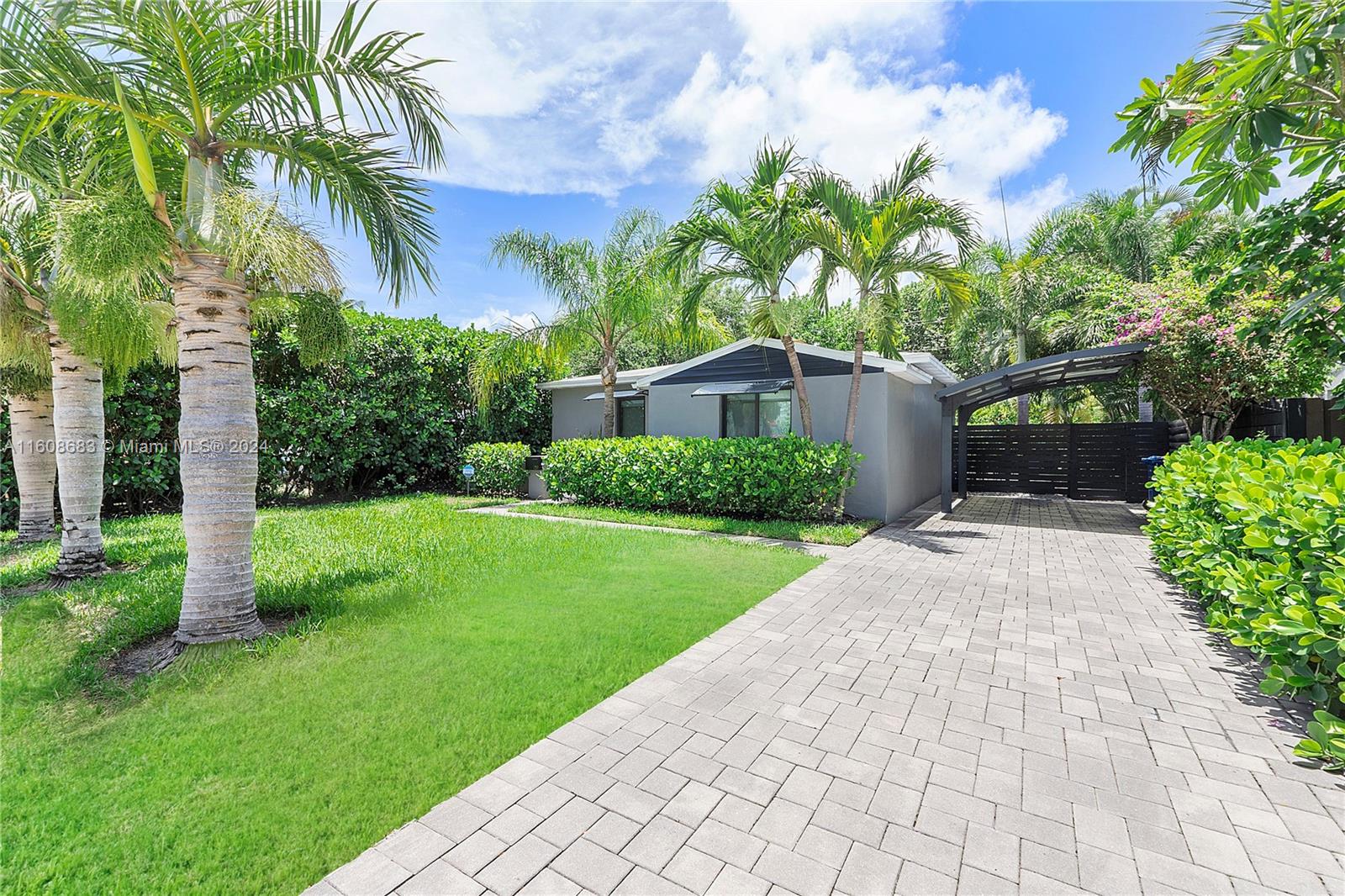 Discover your dream oasis in the vibrant heart of Fort Lauderdale! This delightful 2-bed, 1bath home offers a generous living space, complete with modern upgrades. Enjoy the comfort of a new A/C (May 2024, backed by a transferable 10-year warranty). The home is fortified with Argon gas impact windows (August 2022) and durable fiberglass impact doors, ensuring both style and security. Inside, a convenient laundry room with W/D. Step outside to a spacious yard perfect for gatherings, featuring a stunning deck with ample room for a pool. Additional highlights include a paver driveway, a carport, and extra parking off a private road at the rear of the property. Minutes away from shopping, dining, beaches, and nightlife, this home offers a perfect blend of serenity and accessibility.