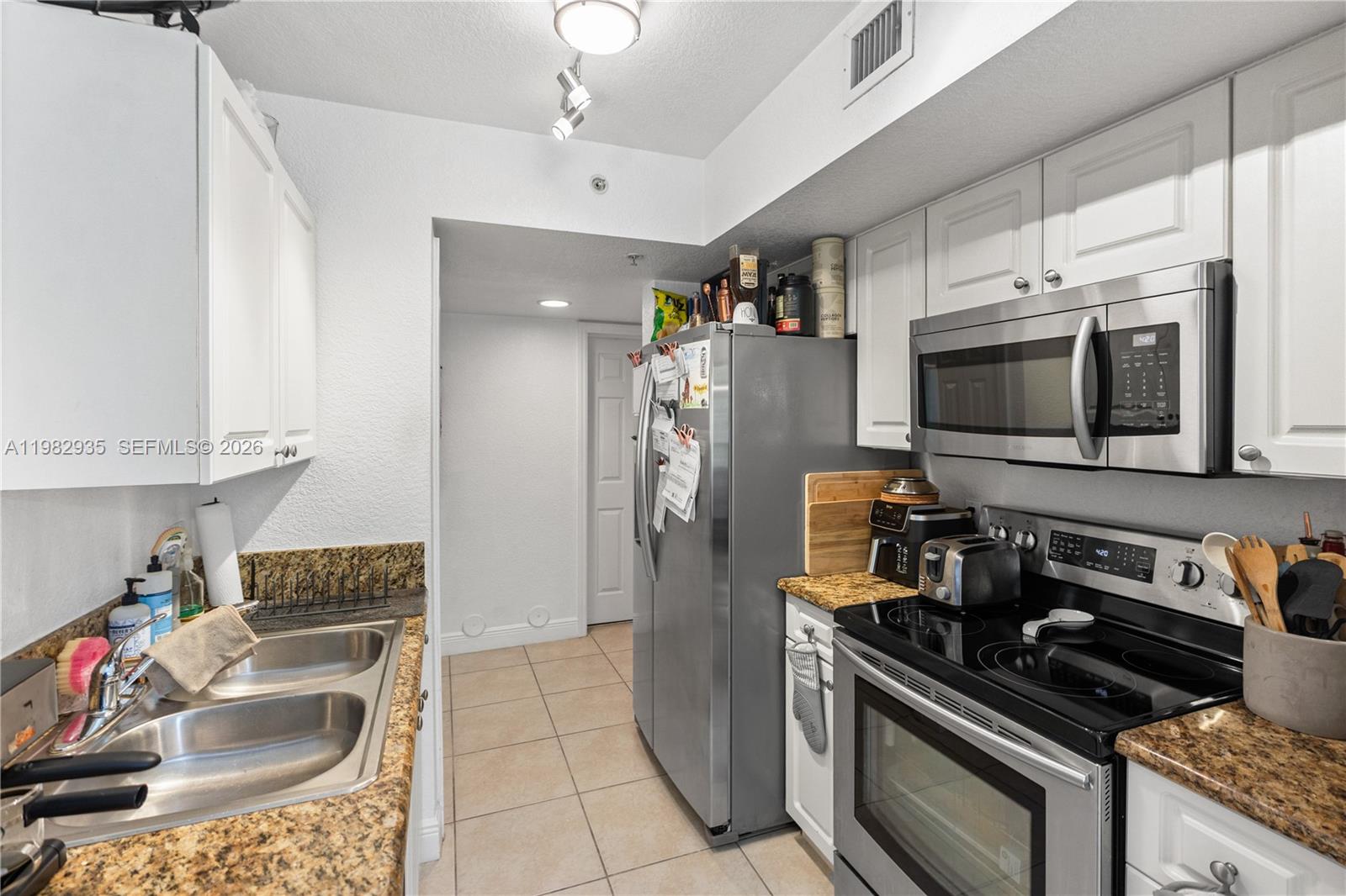 CUTLER LAKES CONDO - Residential Lease