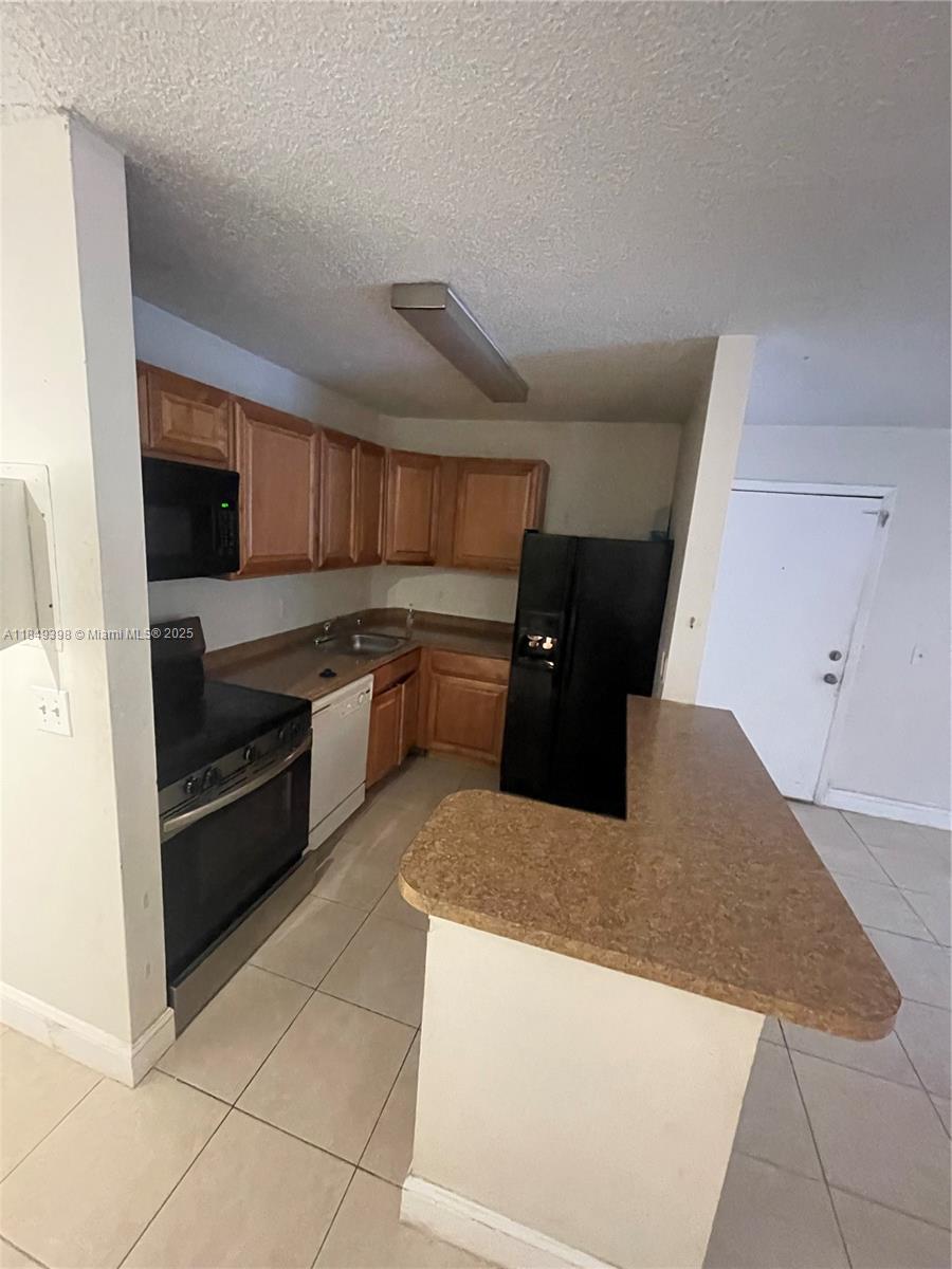Welcome to this inviting 2-bedroom, 2-bathroom condo located in the desirable Lakes of Jacaranda community in Plantation, FL. This first-floor unit offers a spacious layout with approximately 926 sq ft of living space. The open-concept living and dining areas are perfect for entertaining, and the private patio provides a serene outdoor retreat. The condo was recently renovated and features a fresh paint job, brand-new toilets, and a new floor, making it move-in ready and ideal for comfortable living.