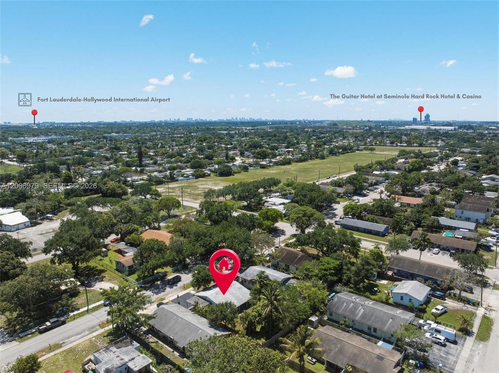 Photo of 1657 SW 44th Ave, Fort Lauderdale, FL 33317 (MLS # A12006979)